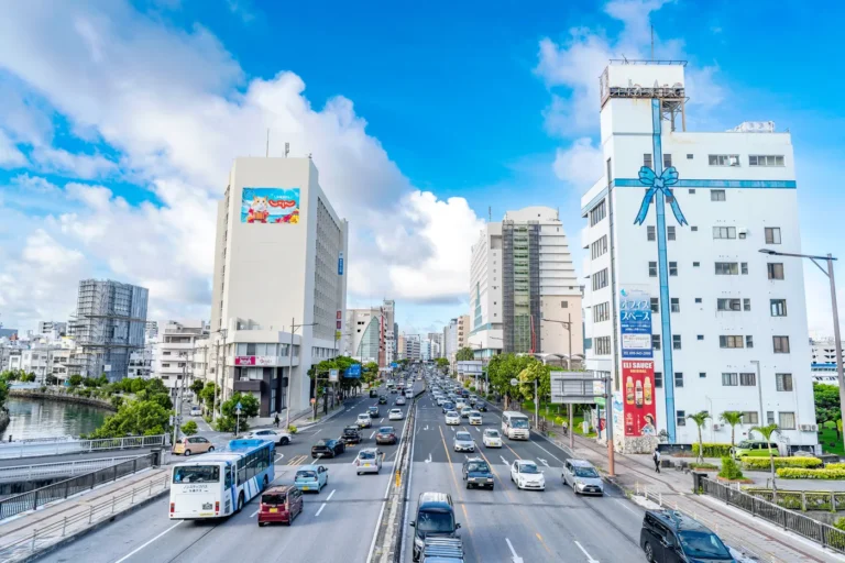 The weather in Okinawa on August 20, 2025, shows the view of the road and buildings along Route 58 and the sky.