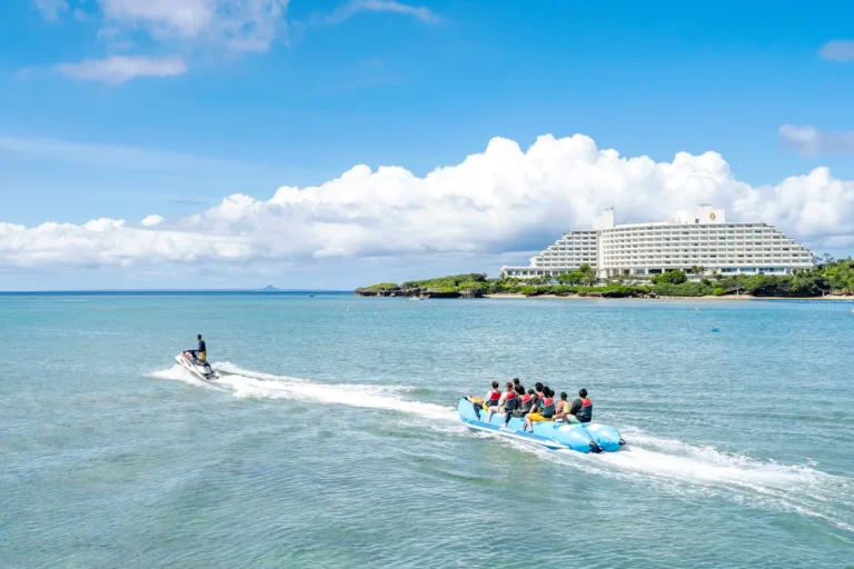 People enjoying marine activities at Onna Beach