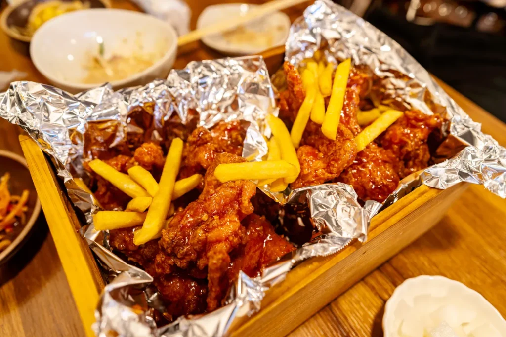 Papachikin — half yangnyeom chicken, half spicy yangnyeom chicken