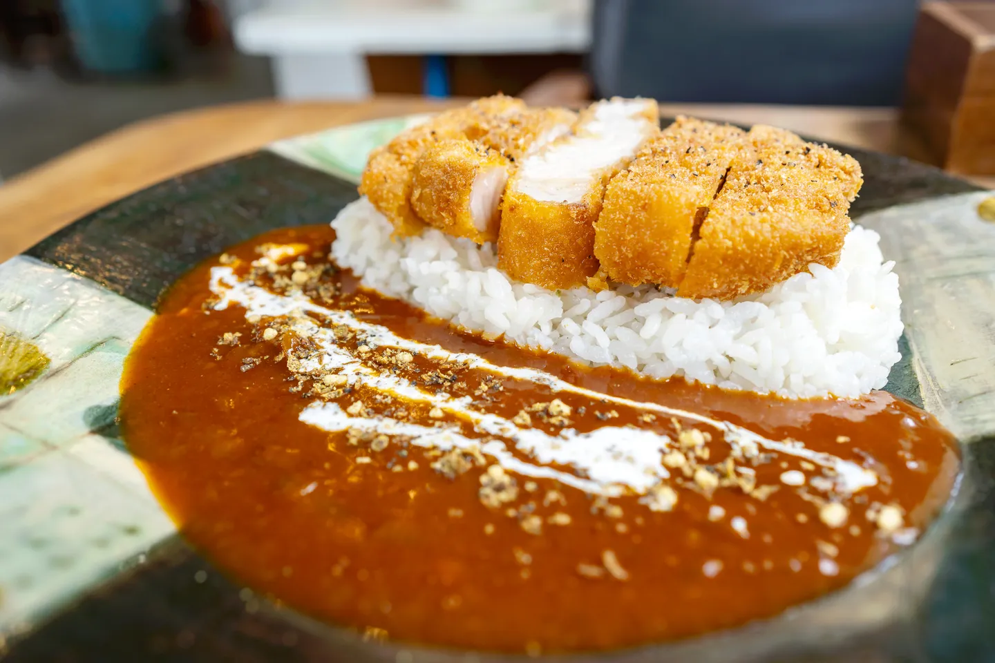 The tonkatsu is thick-cut, and the curry is sweet.
